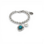 Pulsera Alma bolitas y charms