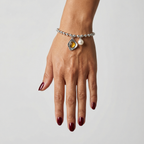 Pulsera Alma bolitas y charms
